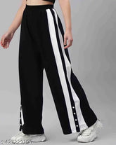Black and white striped cotton bell bottoms trousers for women, comfortable and shiny fabric, perfect for parties and casual wear